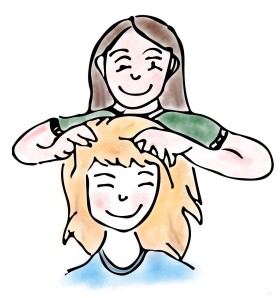 Mutter massiert Lausmittel gut ins  trockene Haar ein