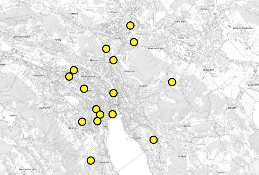 Eine Karte der Stadt mit gelben Punkten. Hier stehen die ausgezeichneten Bauten.