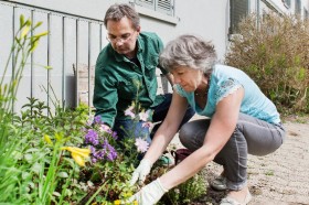 a man and a woman gardening