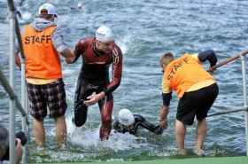 athletes rising out of the water